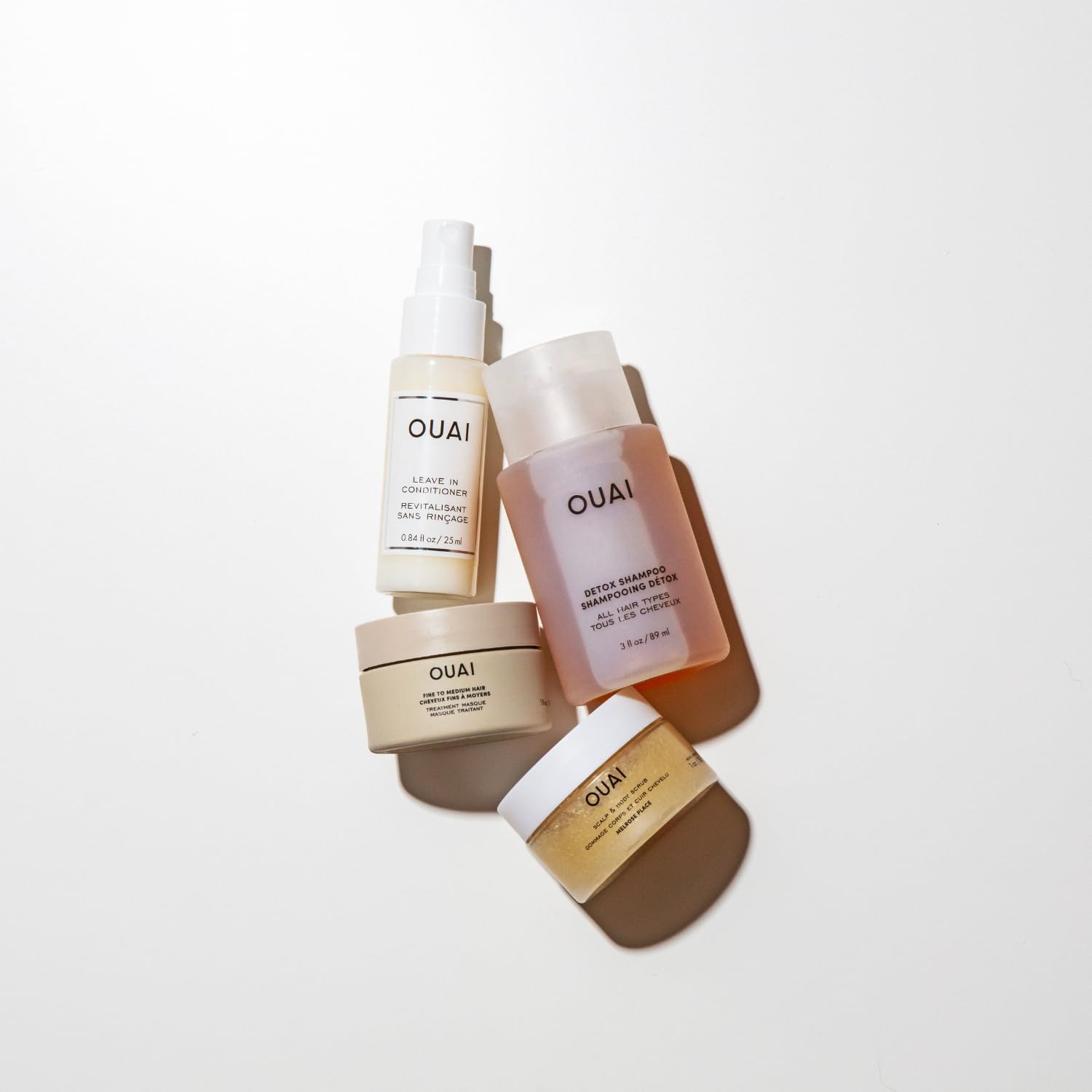 OUAI Travel Kit - Includes Travel Size Leave In Conditioner, Detox Shampoo, Fine to Medium Hair Mask, Scalp & Body Scrub (4 Count) OUAI Au supplements