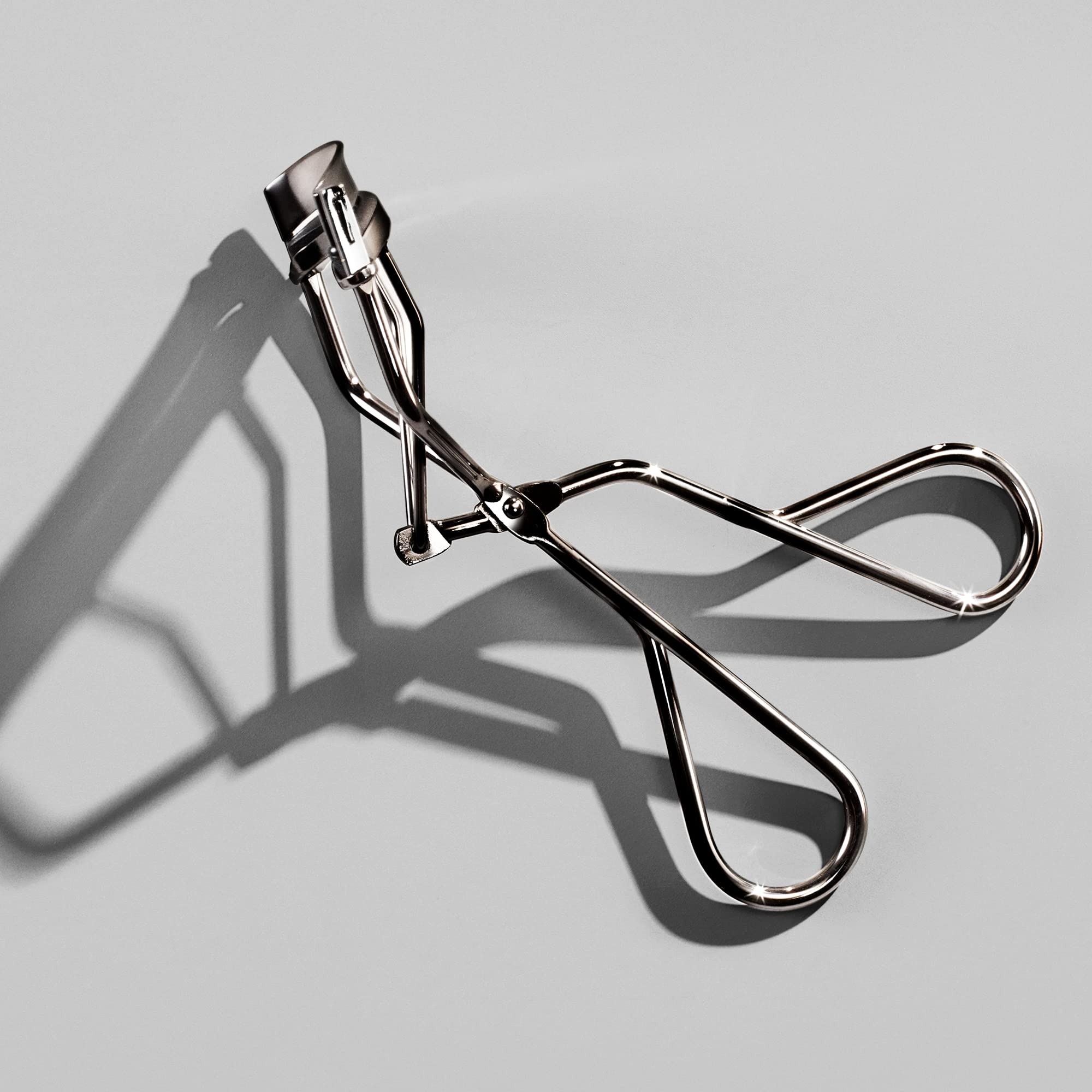 Shiseido Eyelash Curler - Crimps & Curls Lashes for Perfect, Eye-Framing Fringe - Gentle & Safe - Includes Replacement Pad - TrustMedUSA